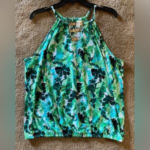 Women’s green and white floral, patterned, sleeveless blouse, size XL.